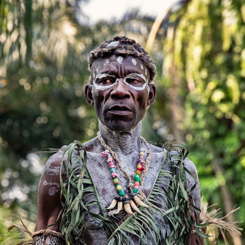 Painted ngombe man during a ceremony