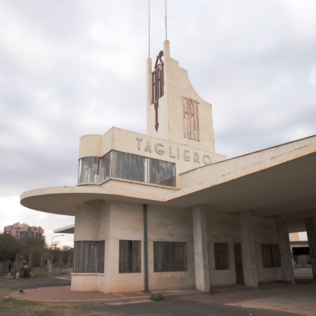 visit to Futurist-style service station Fiat Tagliero Building in architectural tour by Asmara during a trip to Eritrea